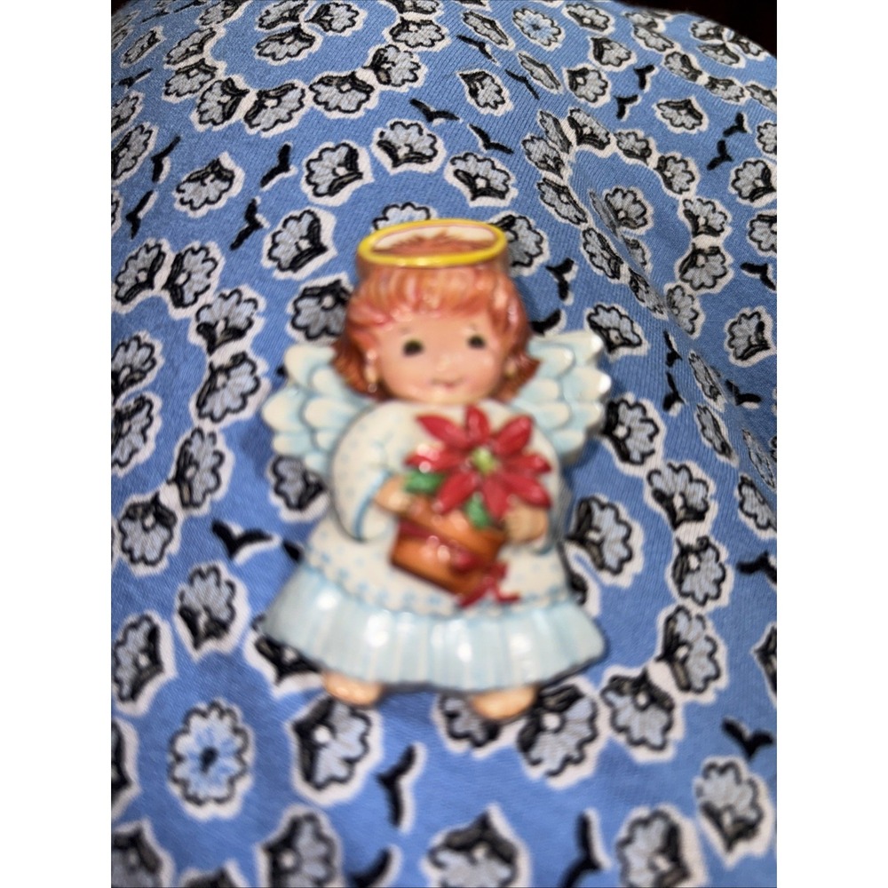 Vintage Molded Plastic Blue Christmas Angel Holding Poinsettia Plant Broach